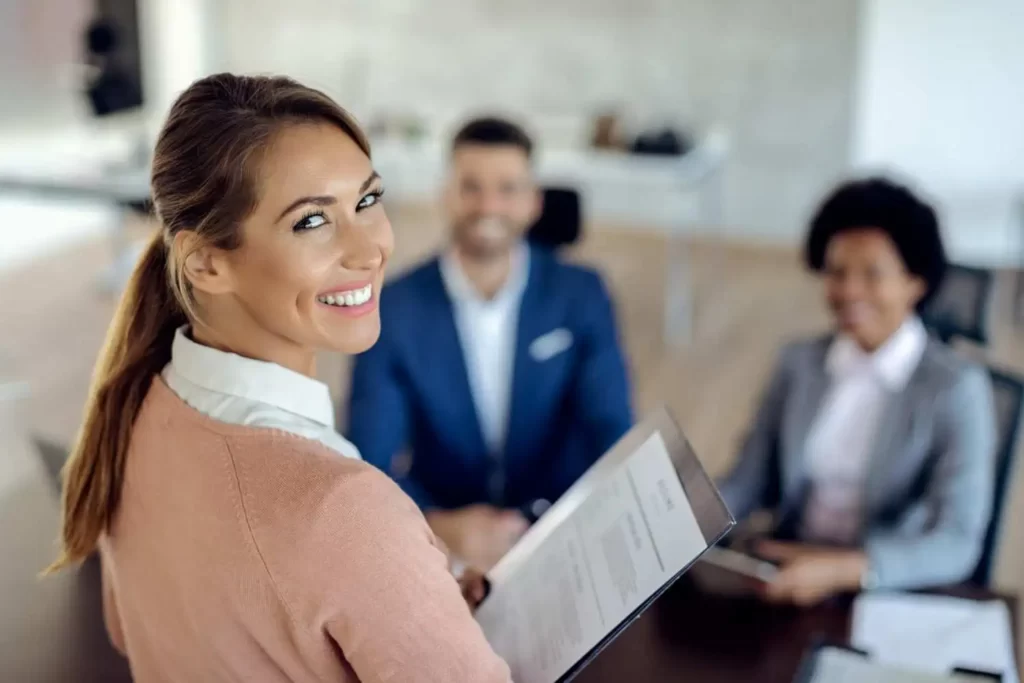 a happy woman at a job interview